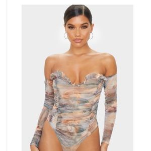 Prettt little thing body suit